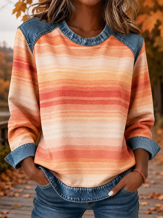 Damen-Top mit gestreiftem Druck und Jeans-Einsätzen für den Herbst